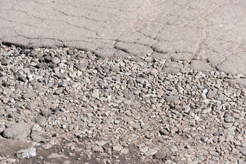 Destroyed asphalt pavement