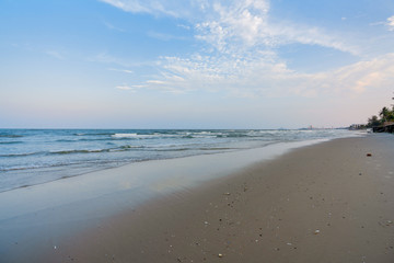 Beautiful Tropical Beach Hua Hin, Prachuap Khiri Khan Province, Thailand. blue ocean background Summer view Sunshine at Sand and Sea Asia Beach Destinations 