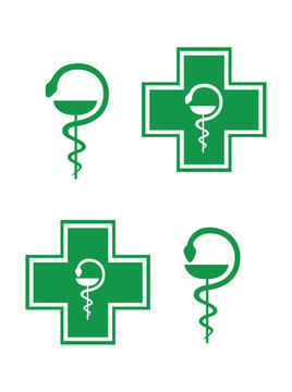 Pharmacy Cross. Set of two Green pharmacy cross and Medical symbol the snake wrapped around the bowl. Vector. Isolated on white background.