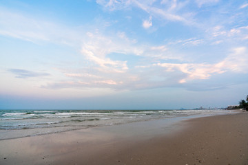 Fototapeta premium Beautiful Tropical Beach Hua Hin, Prachuap Khiri Khan Province, Thailand. blue ocean background Summer view Sunshine at Sand and Sea Asia Beach Destinations 