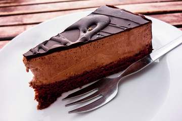 Chocolate cake on plate.