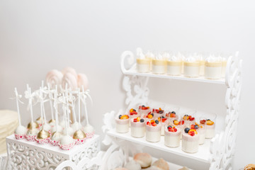 Delicious sweet buffet with cupcakes. Candy Bar.
