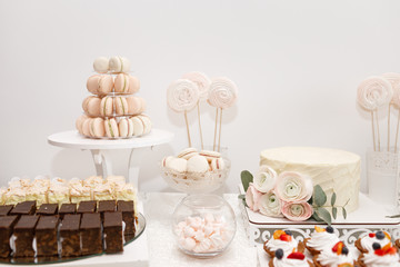 Delicious sweet buffet with cupcakes. Candy Bar.