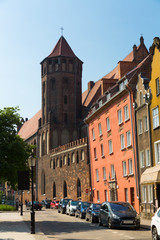 Fototapeta na wymiar Park Swietopelka and St. Nicholas Roman Catholic Church in city Gdansk