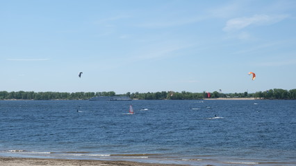 the Volga River, paragliding over the waves