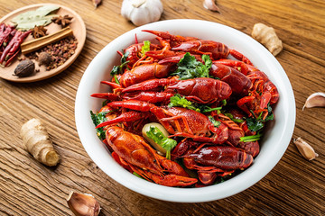 Chinese dish with a bowl of bright red delicious spicy crayfish