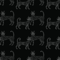 Seamless background of outlines ornamental cats