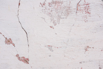 Texture, wall, concrete, it can be used as a background. Wall fragment with scratches and cracks