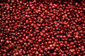 black, white, red peppercorns spice. Closeup Background