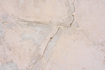 Texture, wall, concrete, it can be used as a background. Wall fragment with scratches and cracks