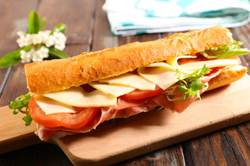 sandwich with ham, cheese and tomato