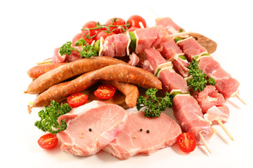 assorted of raw meats, sausage, beef, pork and skewer isolated on white background