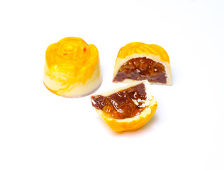 White milk chocolate truffles with a berry jam