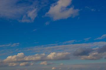 Naklejka na ściany i meble Beautiful photo of clouds in the blue sky, A flock of little clouds