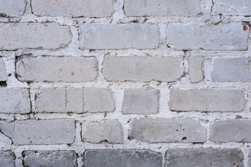 Texture, brick, wall, it can be used as a background. Brick texture with scratches and cracks