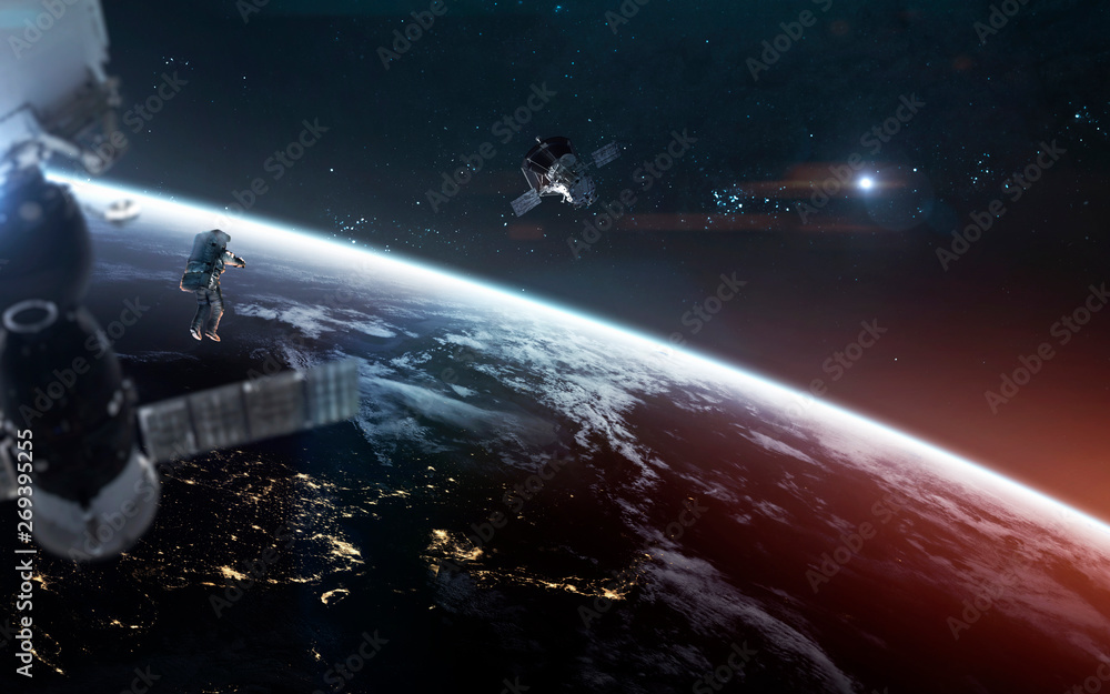 Poster look on our planet from orbit and astronauts at the spacewalk. elements of this image furnished by n