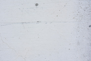 Texture, wall, concrete, it can be used as a background. Wall fragment with scratches and cracks