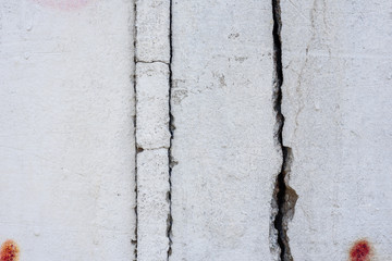 Texture, wall, concrete, it can be used as a background. Wall fragment with scratches and cracks