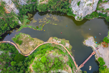 aerial over view khao ngoo mountain rock or snake mountain rock are high cliff and landmark ratchaburi province thailand