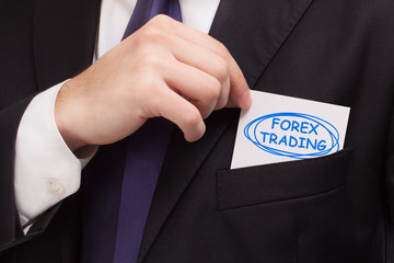 Business, technology, internet and networking concept. Young entrepreneur showing keyword: Forex...