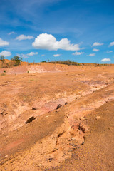 Dry, orange soil and blue sky in the countryside of Oeiras - Piaui state, Brazil (Sertao landscape)