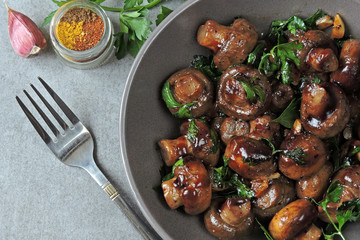 Mushrooms, glazed in soy sauce with spices and parsley. Vegan lunch