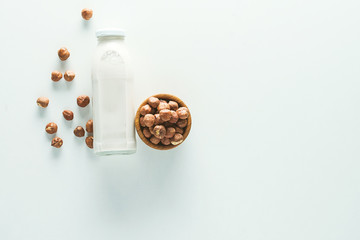 vegan milk in glass jar on white background