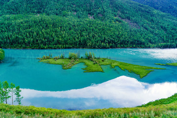beautiful Kanas Lake Wolong Bay in summer，Altay, Xinjiang, China