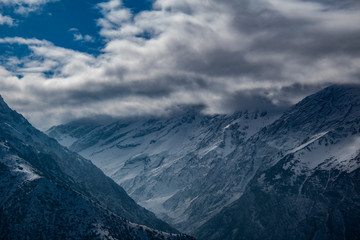 snow on the mountain and clouds 
