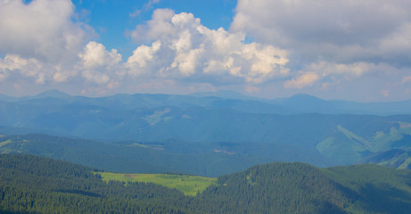 Obraz premium Hiking with a tent through Petros to Hoverla, Lake Nesamovite, Mount Pop Ivan Observatory.