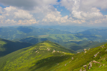 Obraz premium Hiking with a tent through Petros to Hoverla, Lake Nesamovite, Mount Pop Ivan Observatory.