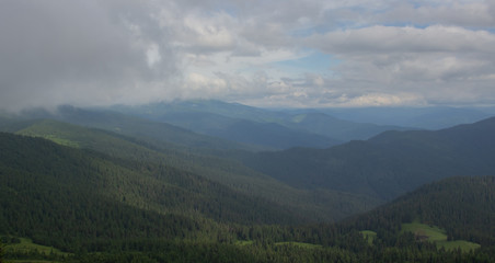 Naklejka premium Hiking with a tent through Petros to Hoverla, Lake Nesamovite, Mount Pop Ivan Observatory.