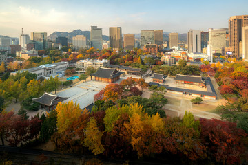 Fototapeta premium Deoksugung Palace and Seoul city in autumn season in Seoul, South Korea.