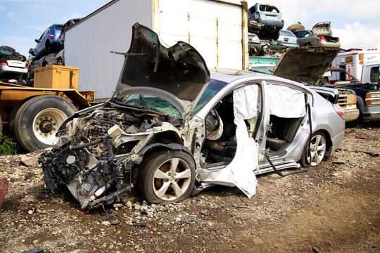 smashing cars at the junkyard car crushing