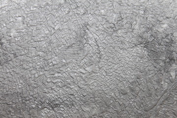 gray white wallpaper with a sharp ornament