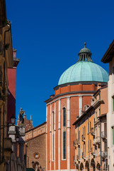 View of Vicenza Cathedral apse with dome designed by the famous architect Andrea Palladio in the 16th century and blue sky (with copy space above)