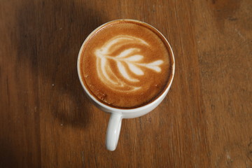 Cup of coffee nice draw in cream