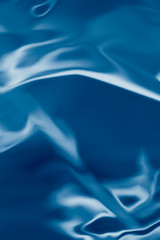 Obraz premium . Blue liquid shiny background.