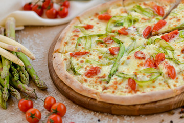  pizza with asparagus and tomatoes