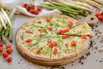  pizza with asparagus and tomatoes