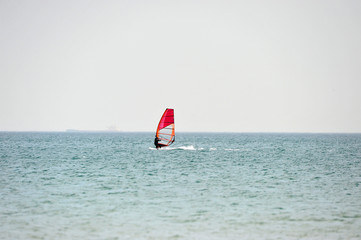 Wind surfing at the sea