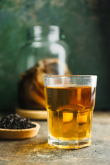 Kombucha tea on rustic background