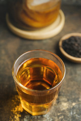 Kombucha tea on rustic background