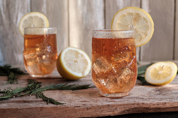 Red tea with ice and lemon