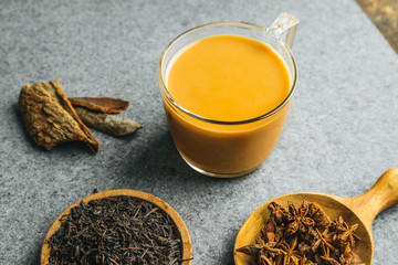 Chai tea latte on concrete background