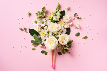 Doll legs and white rose, flowers, leaves on pink background. Contemporary art collage. Spa, body...