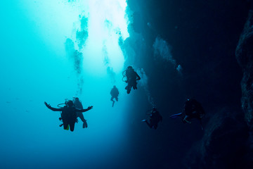 Scuba divers underwater, The Great Blue Hole, Belize Barrier Reef, Lighthouse Reef, Belize