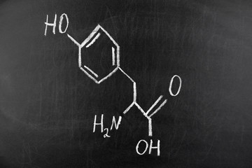 Blackboard with the chemical formula of Thyrosine