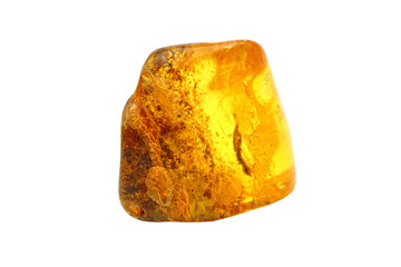 Beautiful transparent piece of amber on a white background. Yellow natural mineral. Material for jewelers. Advertising for jewelry store. Sun Stone Colored crystal. Inclusions. Natural amber