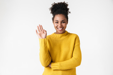 Image closeup of positive african american woman looking at camera and waving
